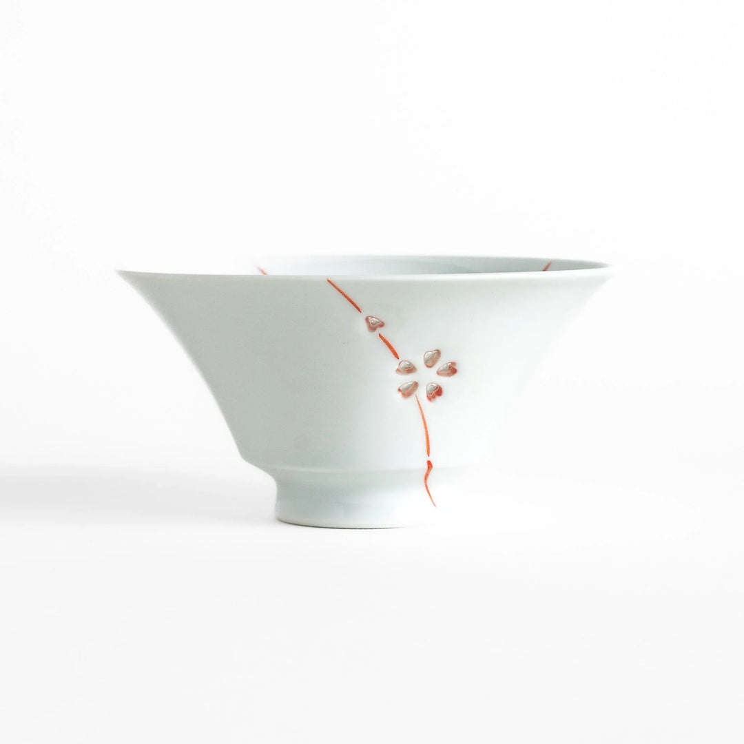 Petal crystal rice bowl with floral designs on white porcelain ideal for serving rice with elegance.