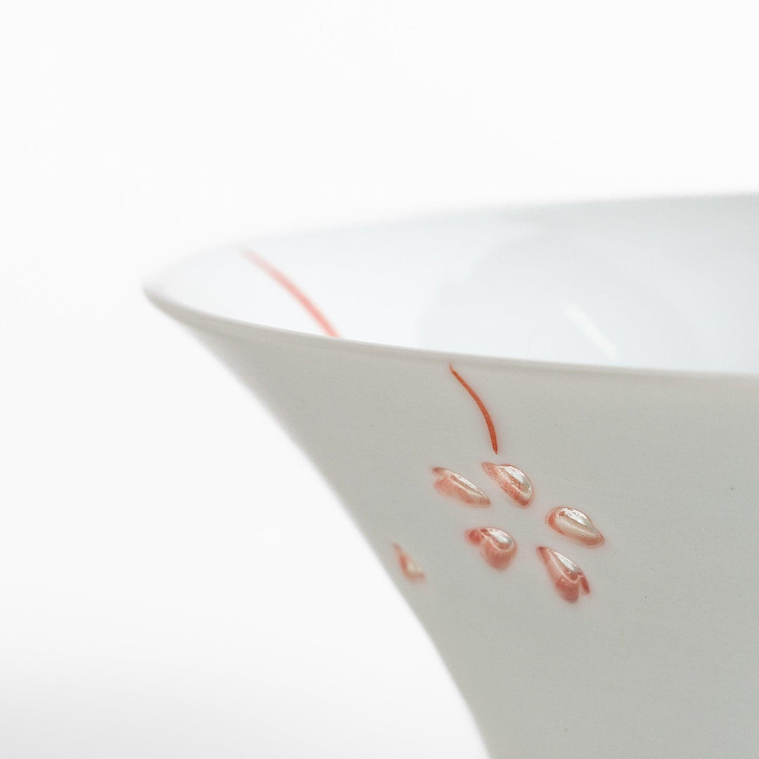 Petal crystal rice bowl with floral designs on white porcelain ideal for serving rice with elegance.