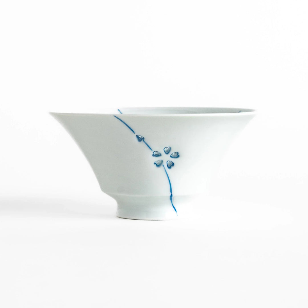 Petal crystal rice bowl with floral designs on white porcelain ideal for serving rice with elegance.