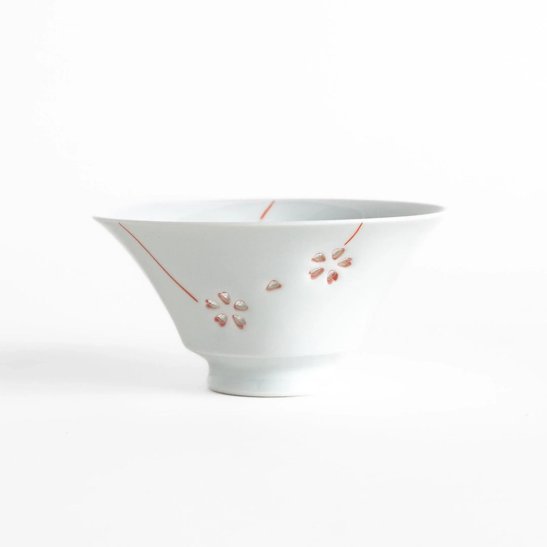 Petal crystal rice bowl with floral designs on white porcelain ideal for serving rice with elegance.