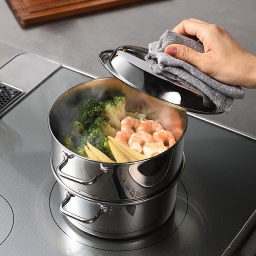 Compact stainless steel steamer serving freshly steamed dishes directly for convenient home dining.