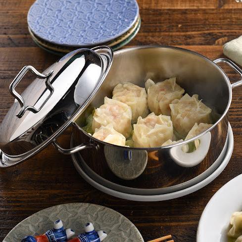 Compact stainless steel steamer serving freshly steamed dishes directly for convenient home dining.