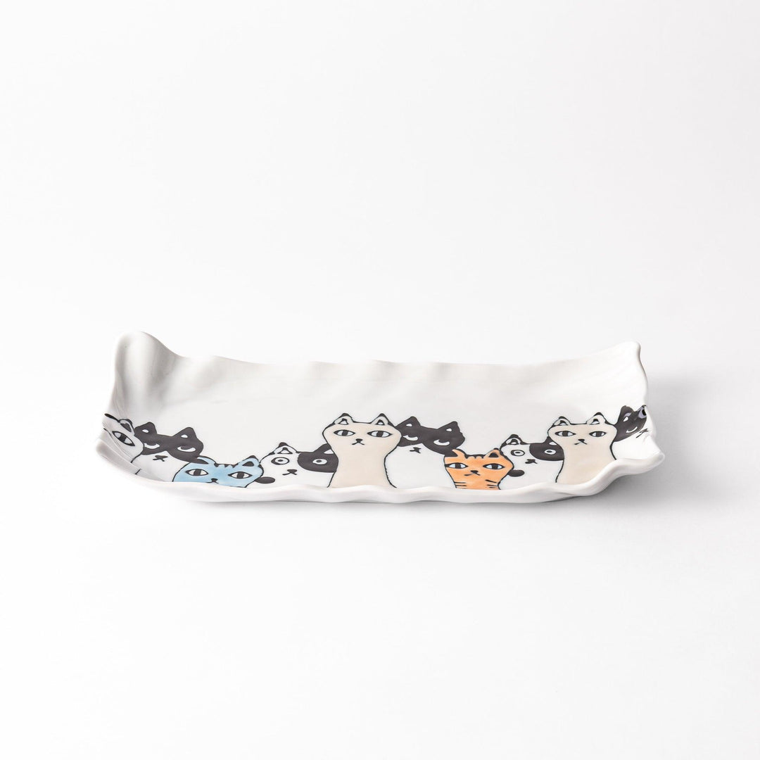 Salad plate with colorful cats in black, white, orange, and blue, wavy-edged for a whimsical table accent.