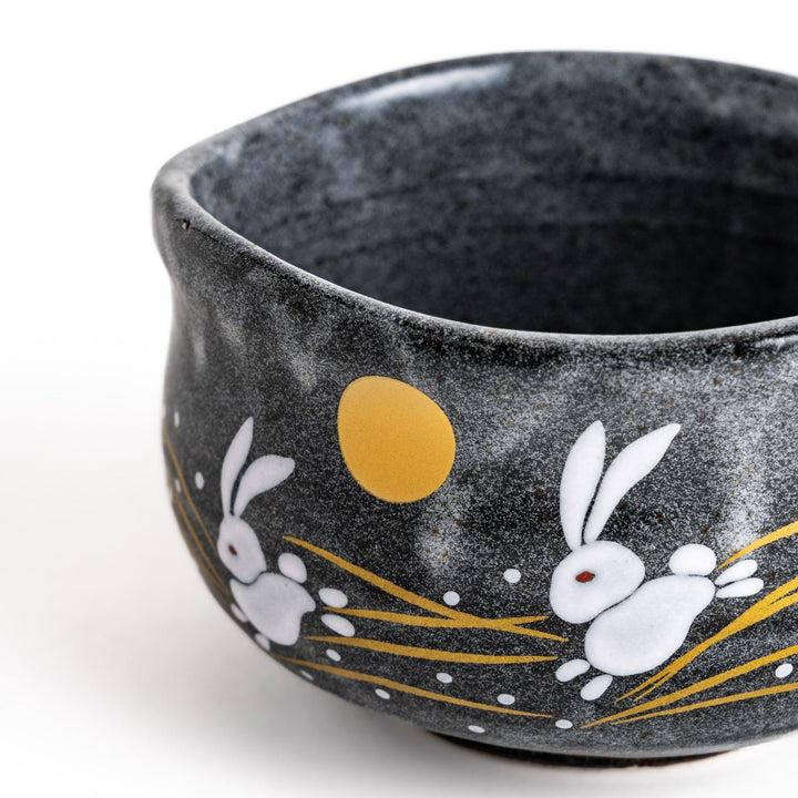 Gray matcha bowl with rabbit and moon design perfect for preparing and enjoying traditional matcha.