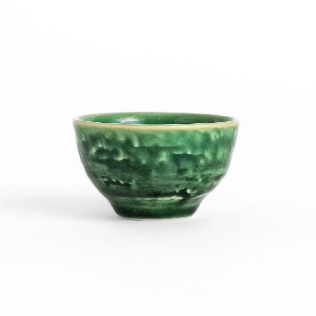 Deep pine green sake cup with a glossy, textured finish, ideal for sipping sake in a traditional and elegant style.