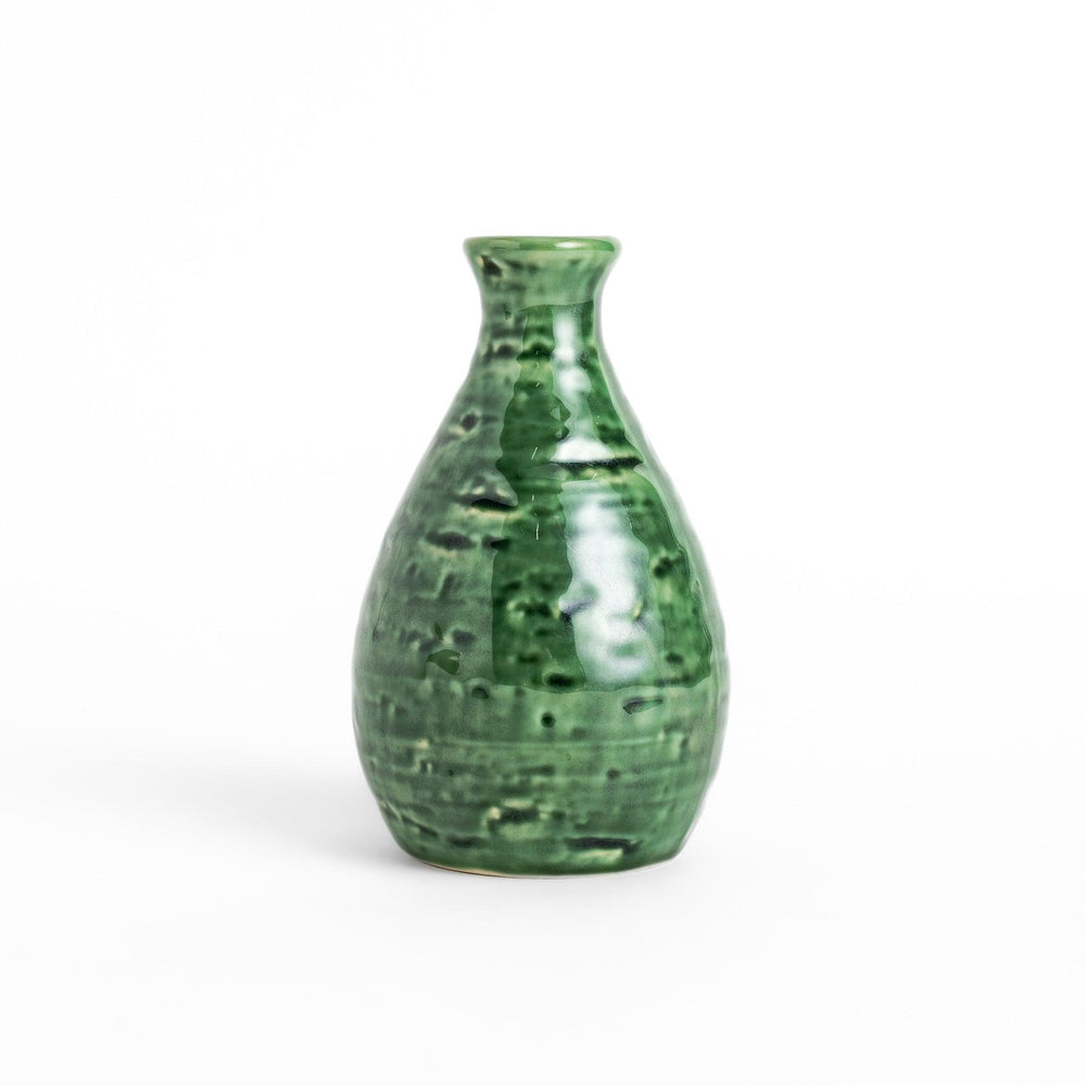 Glossy green ceramic sake flask with a textured finish and classic shape, ideal for serving warm or chilled sake.