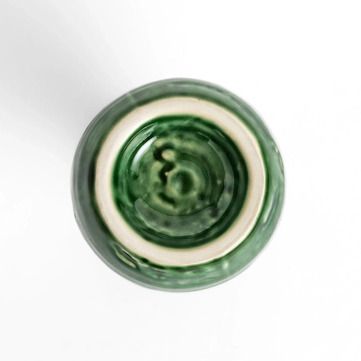 Glossy green ceramic sake flask with a textured finish and classic shape, ideal for serving warm or chilled sake.