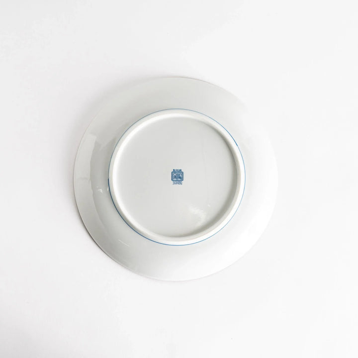 A round dinner plate displaying a blue and white lattice design, similar to traditional Japanese patterns.