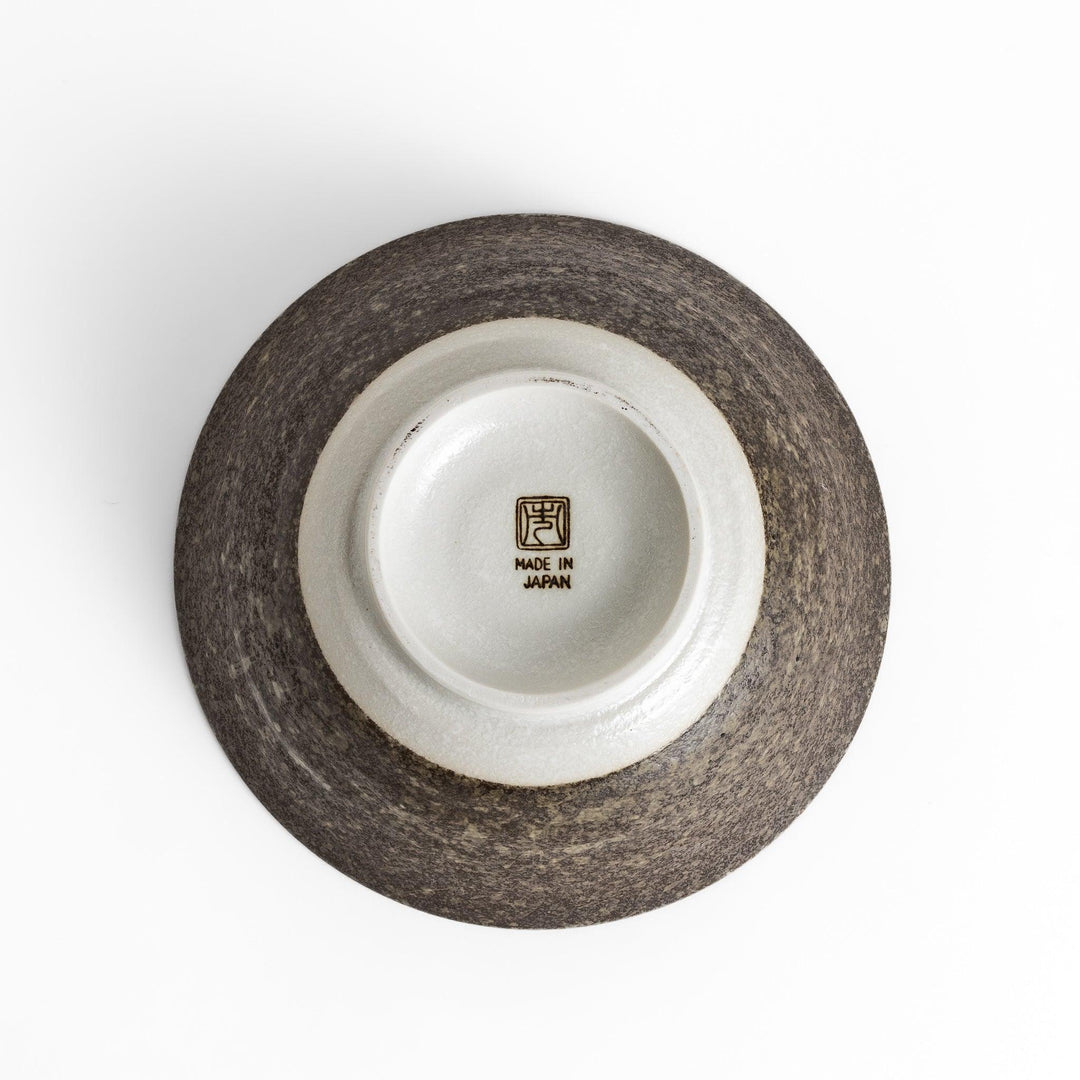 Textured ramen bowl with an earthy brown exterior, featuring a smooth white interior and a sturdy base for comfortable use.