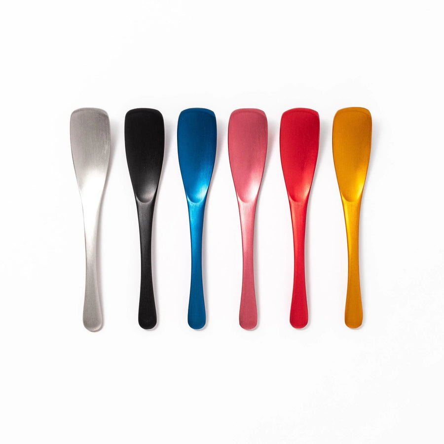 Aluminum ice cream spoon in vibrant color designed for easy scooping and comfortable grip with frozen desserts.