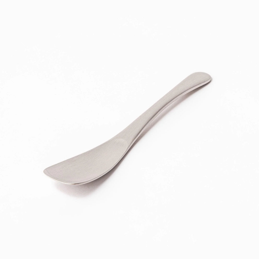 Silver aluminum ice cream spoon with satin finish and flat edge for smoothly scooping hard frozen desserts.