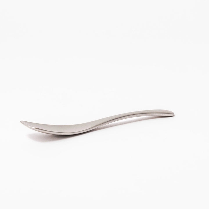 Silver aluminum ice cream spoon with satin finish and flat edge for smoothly scooping hard frozen desserts.