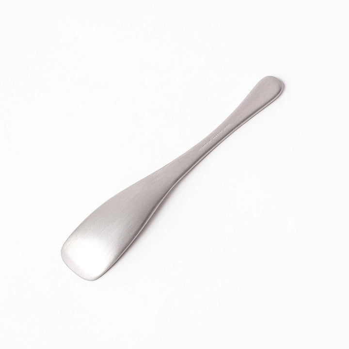 Silver aluminum ice cream spoon with satin finish and flat edge for smoothly scooping hard frozen desserts.