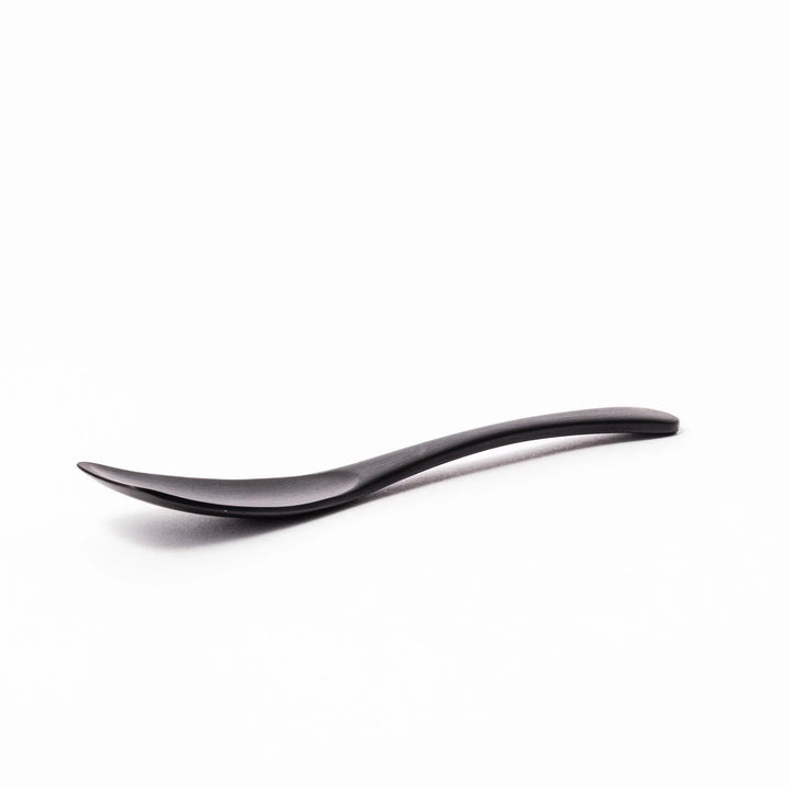 Matte black aluminum ice cream spoon with flat edge designed for easy scooping of firm frozen desserts.