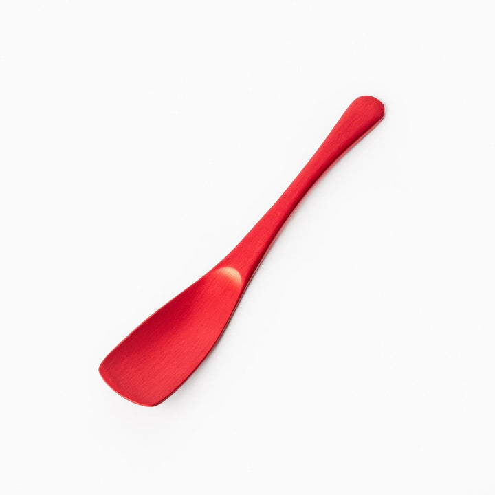 Red aluminum ice cream spoon with a flat edge and matte finish, designed to cut through hard ice cream with ease and comfort.