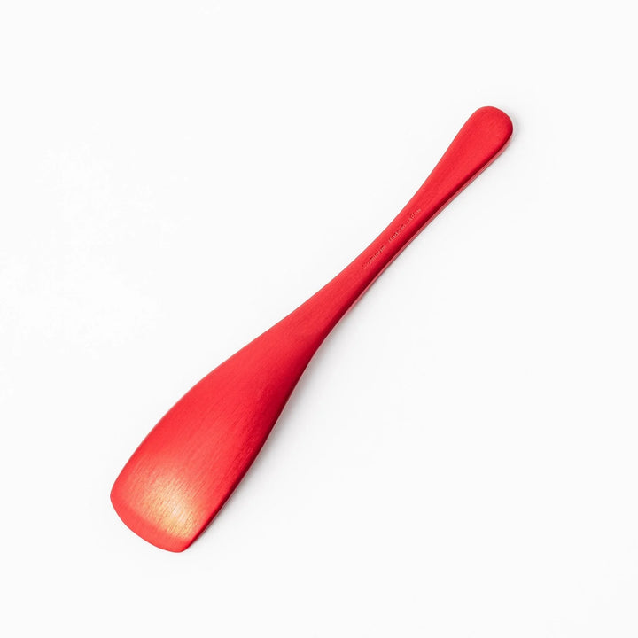 Red aluminum ice cream spoon with a flat edge and matte finish, designed to cut through hard ice cream with ease and comfort.