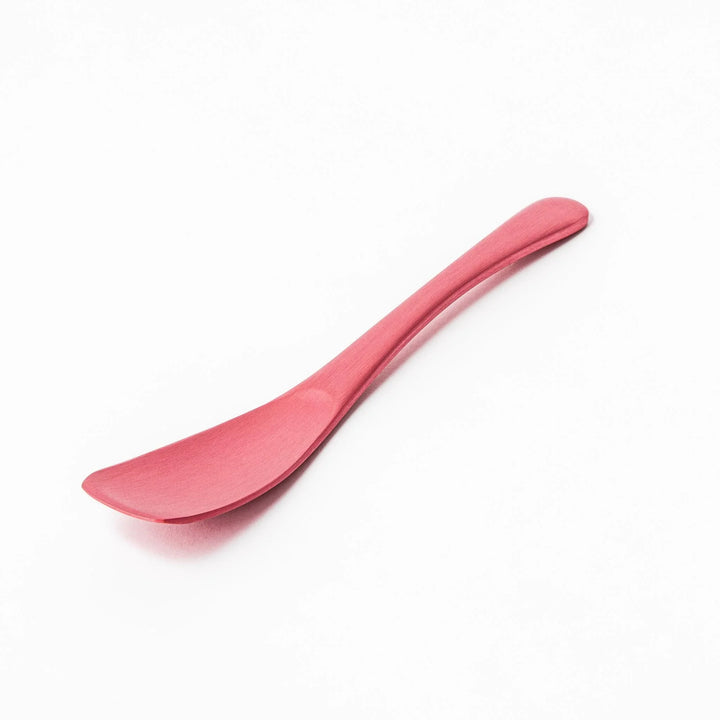 Pink aluminum ice cream spoon with ergonomic curve and matte finish, perfect for effortlessly scooping hard ice cream.