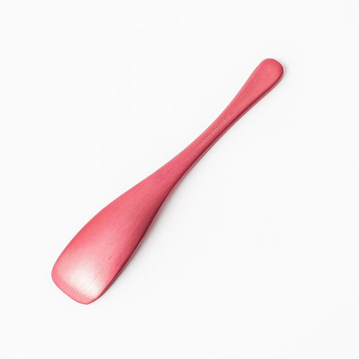 Pink aluminum ice cream spoon with ergonomic curve and matte finish, perfect for effortlessly scooping hard ice cream.