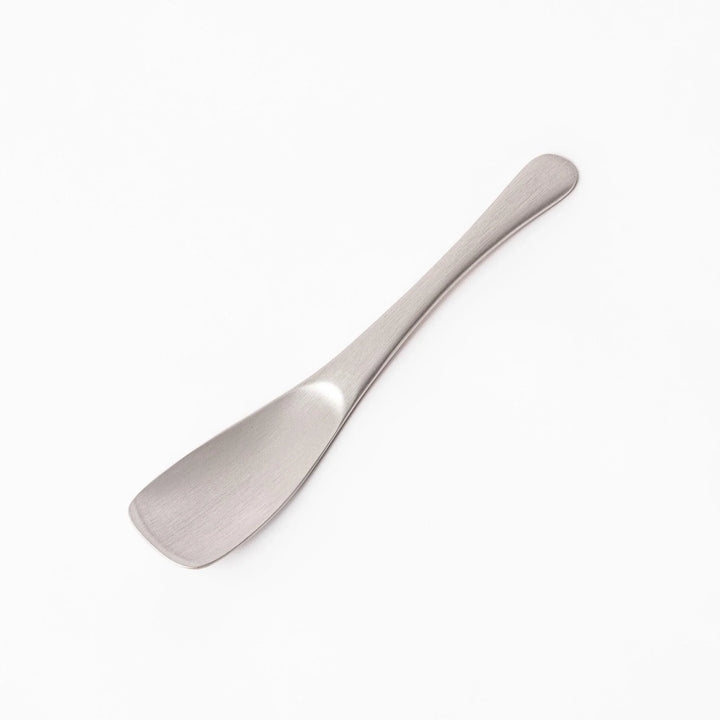 Silver aluminum ice cream spoon with satin finish and flat edge for smoothly scooping hard frozen desserts.