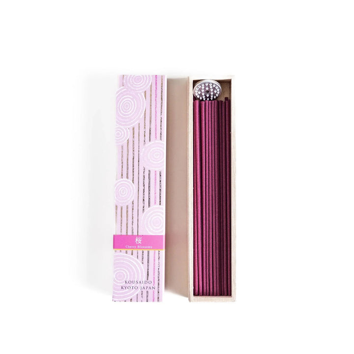 Cherry blossom incense sticks in a pink box with holder, offering a gentle floral fragrance inspired by Japanese spring