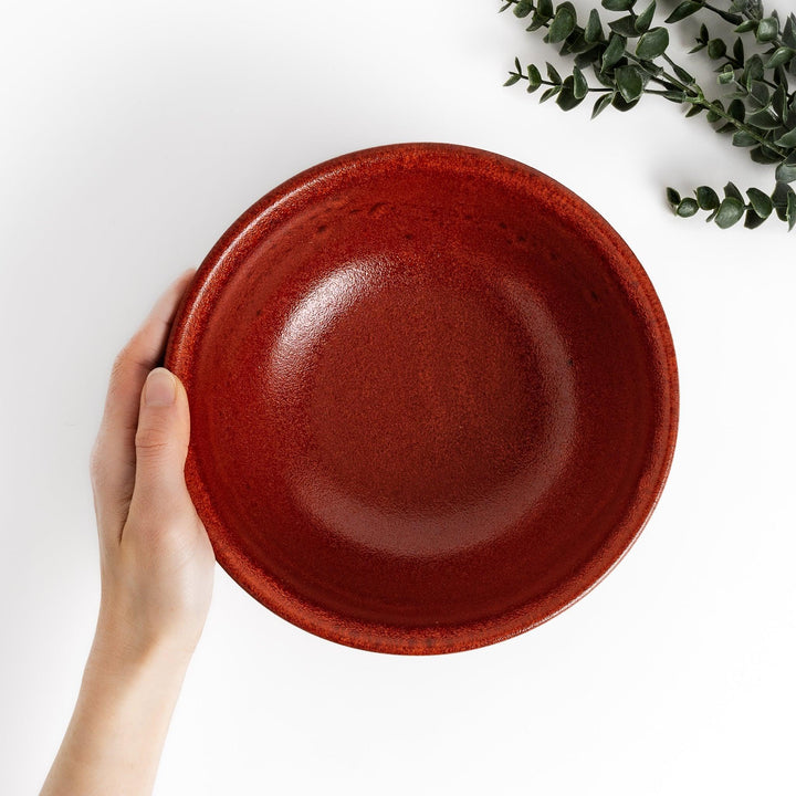 Ramen bowl with a striking ember glaze featuring a dark, smooth base and a vibrant reddish-orange finish on the upper rim.