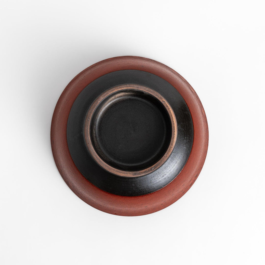 Ramen bowl with a striking ember glaze featuring a dark, smooth base and a vibrant reddish-orange finish on the upper rim.