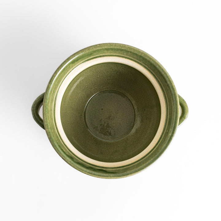 Emerald rice donabe clay pot with green glaze and round lid ideal for cooking flavorful Japanese rice.