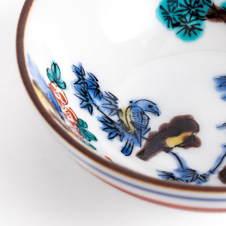 Elegant ceramic mug with vibrant floral gold and pastel design adding sophistication to daily use.