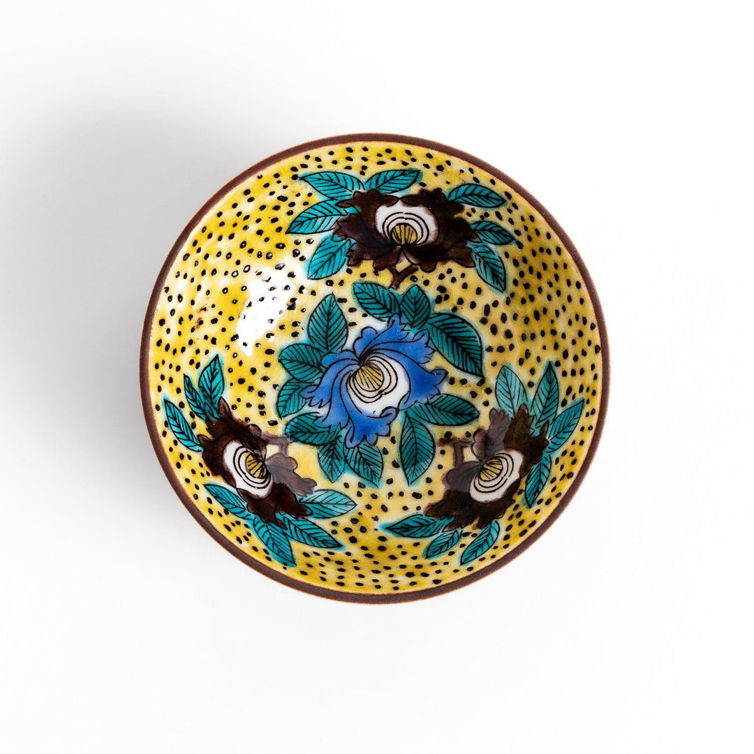 Elegant ceramic mug with vibrant floral gold and pastel design adding sophistication to daily use.