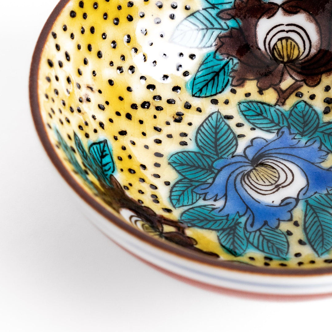 Elegant ceramic mug with vibrant floral gold and pastel design adding sophistication to daily use.