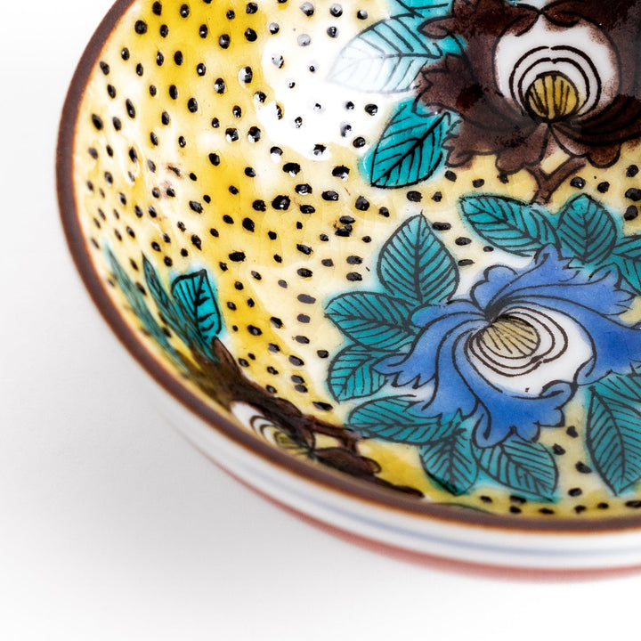 Elegant ceramic mug with vibrant floral gold and pastel design adding sophistication to daily use.