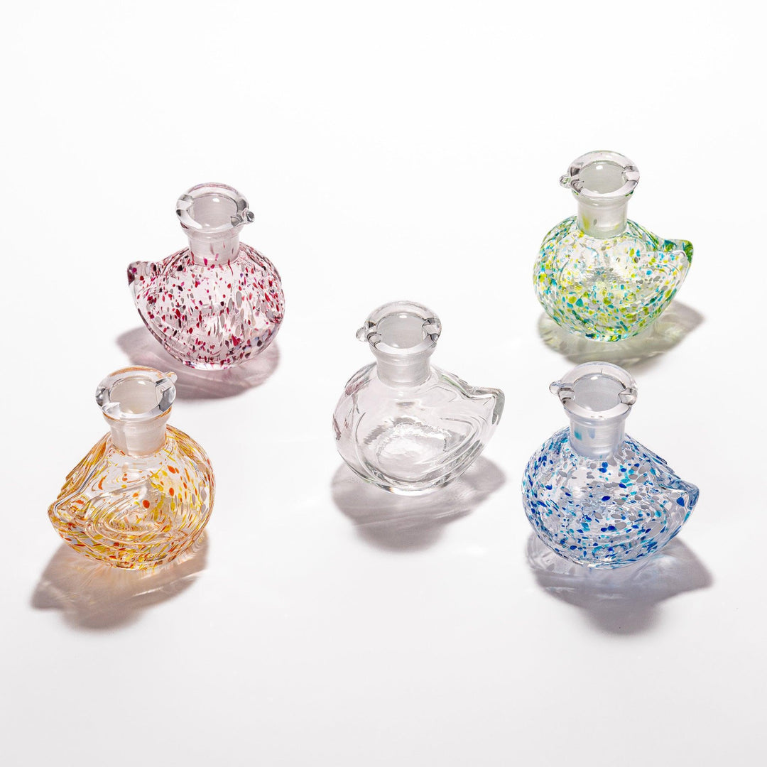 Ethereal Songbird soy sauce dispenser with a colorful speckled design, perfect for adding a whimsical touch to the table.