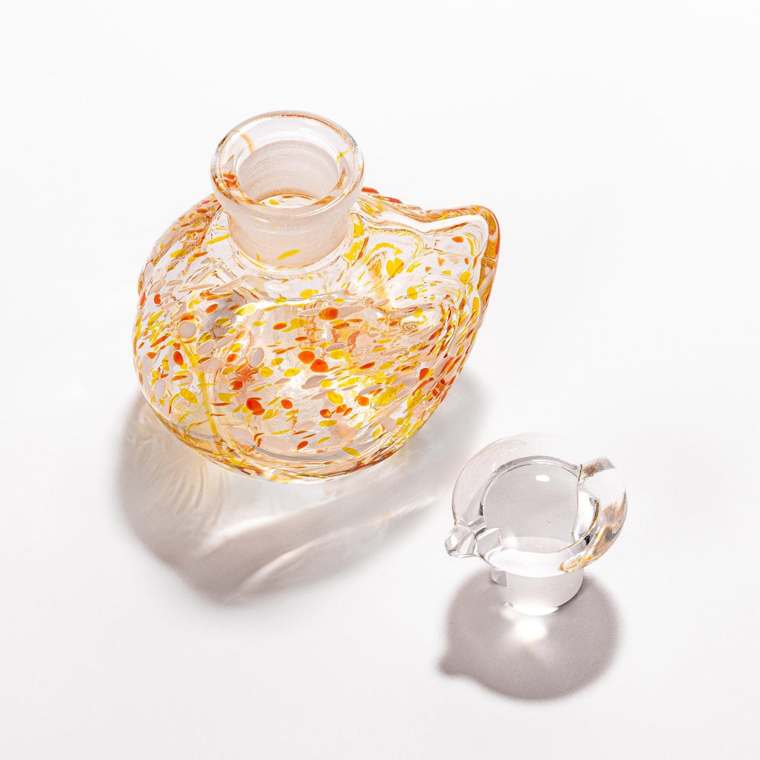 Ethereal Songbird soy sauce dispenser with a colorful speckled design, perfect for adding a whimsical touch to the table.