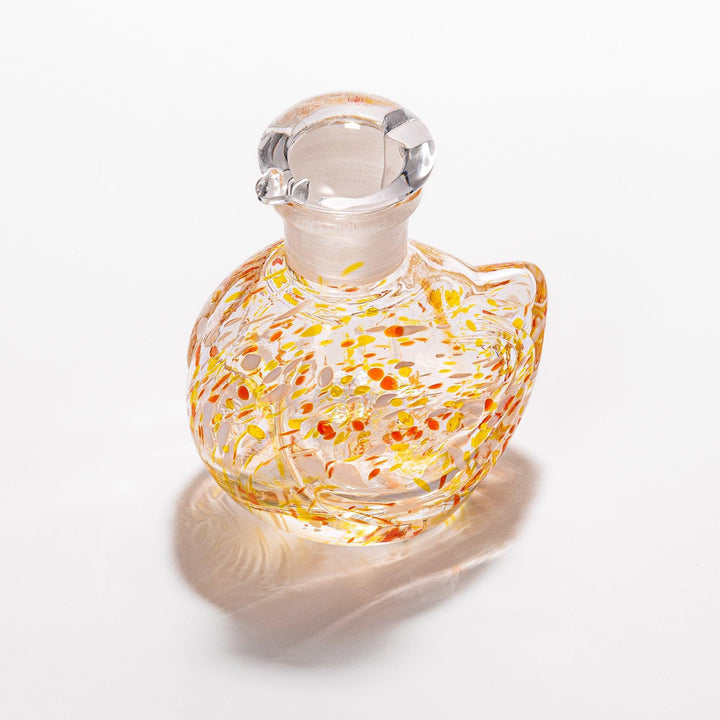 Ethereal Songbird soy sauce dispenser with a colorful speckled design, perfect for adding a whimsical touch to the table.