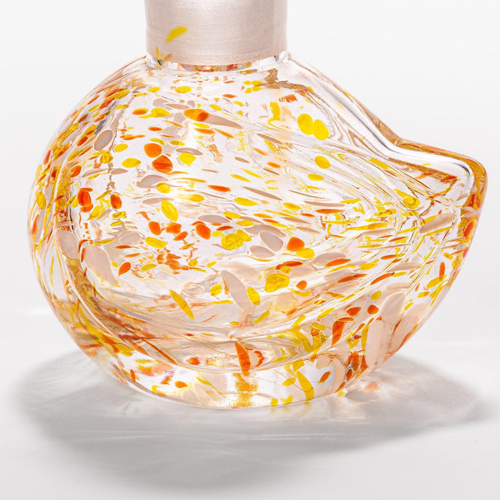 Ethereal Songbird soy sauce dispenser with a colorful speckled design, perfect for adding a whimsical touch to the table.