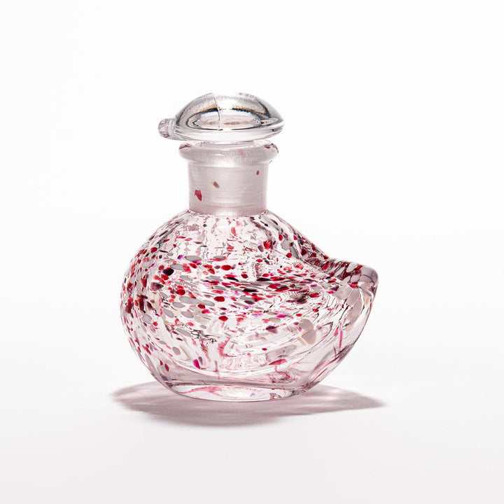 Ethereal Songbird soy sauce dispenser with a colorful speckled design, perfect for adding a whimsical touch to the table.