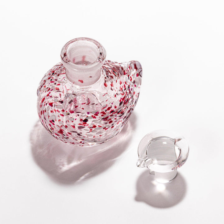 Ethereal Songbird soy sauce dispenser with a colorful speckled design, perfect for adding a whimsical touch to the table.