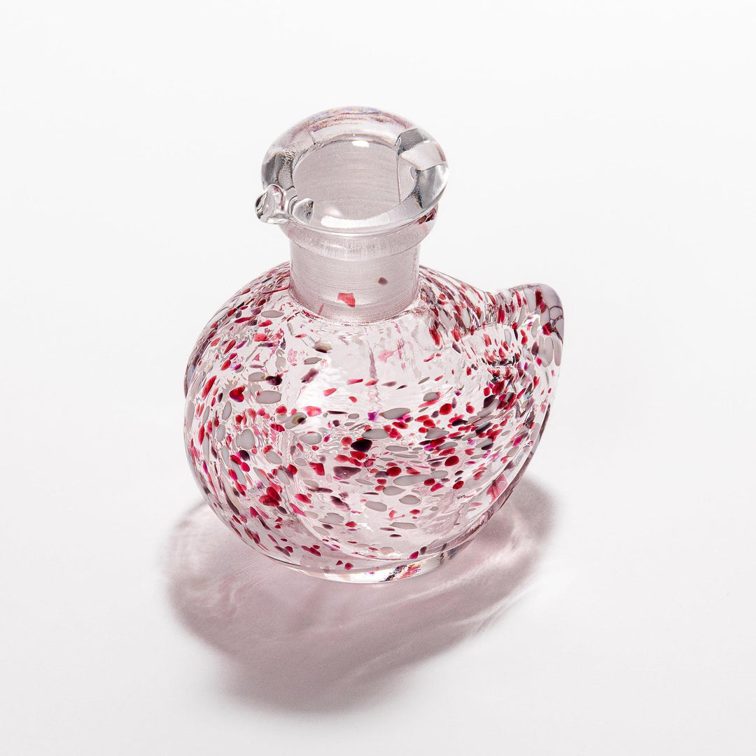 Ethereal Songbird soy sauce dispenser with a colorful speckled design, perfect for adding a whimsical touch to the table.