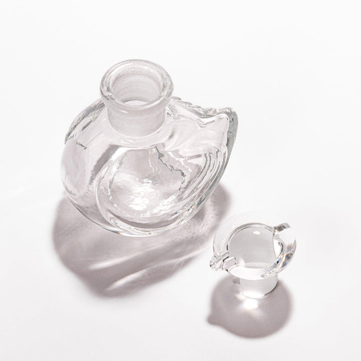 Ethereal Songbird soy sauce dispenser with a colorful speckled design, perfect for adding a whimsical touch to the table.