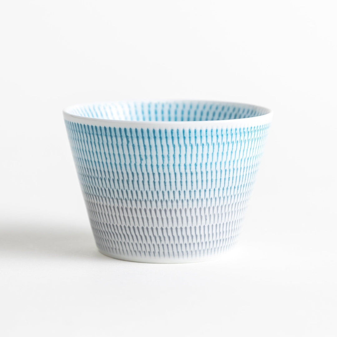 Japanese porcelain dessert bowl with delicate vertical line pattern and smooth gradient design for modern, everyday dining