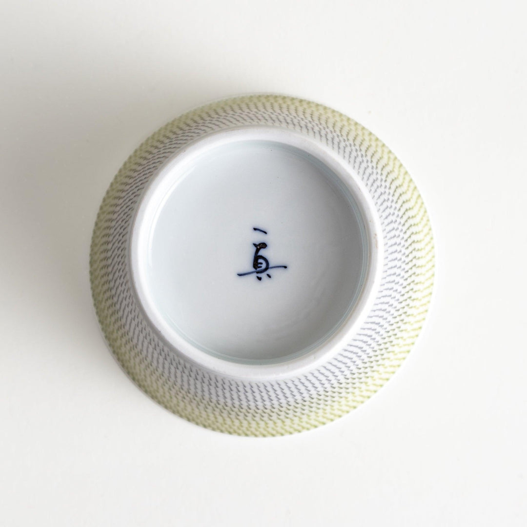Japanese porcelain dessert bowl with delicate vertical line pattern and smooth gradient design for modern, everyday dining
