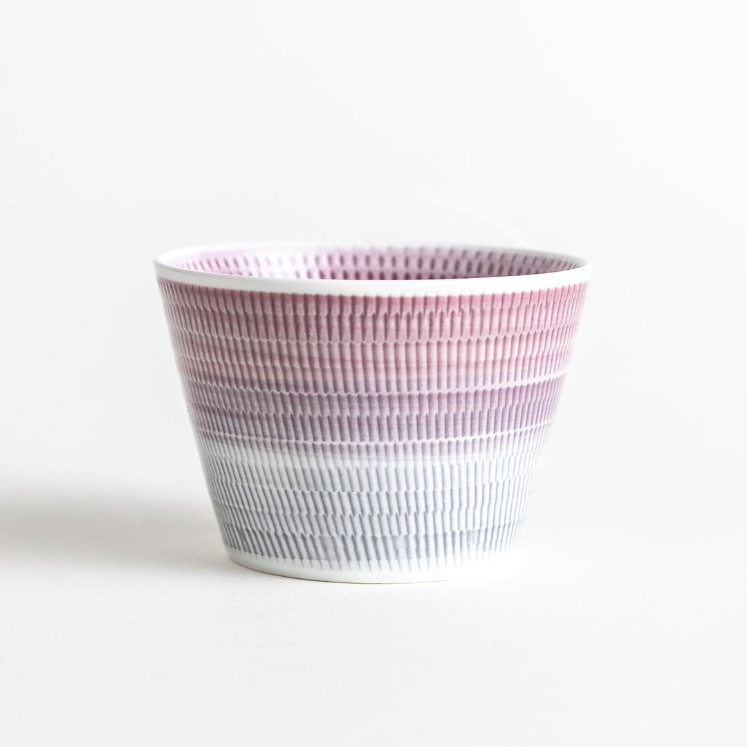 Japanese porcelain dessert bowl with delicate vertical line pattern and smooth gradient design for modern, everyday dining