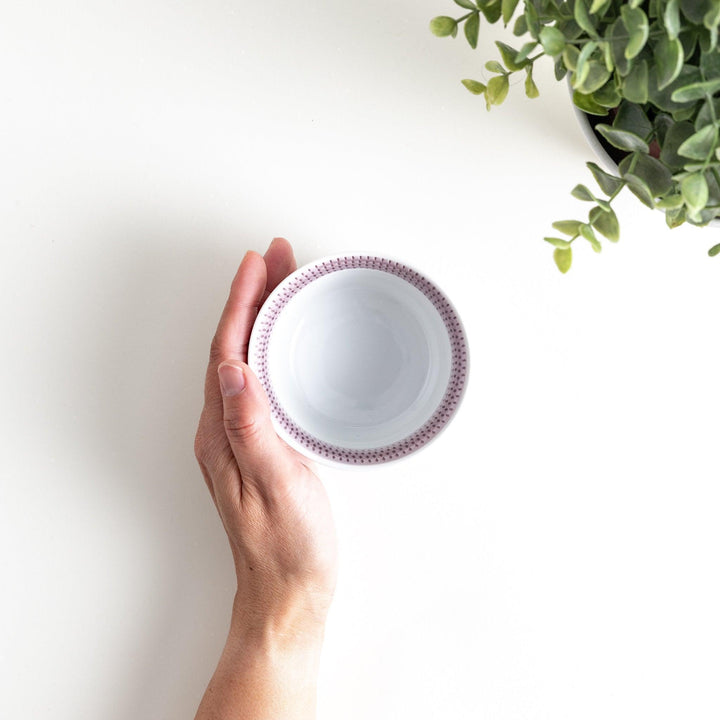 Japanese porcelain dessert bowl with delicate vertical line pattern and smooth gradient design for modern, everyday dining