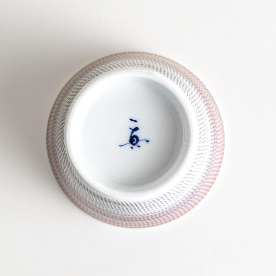 Japanese porcelain dessert bowl with delicate vertical line pattern and smooth gradient design for modern, everyday dining