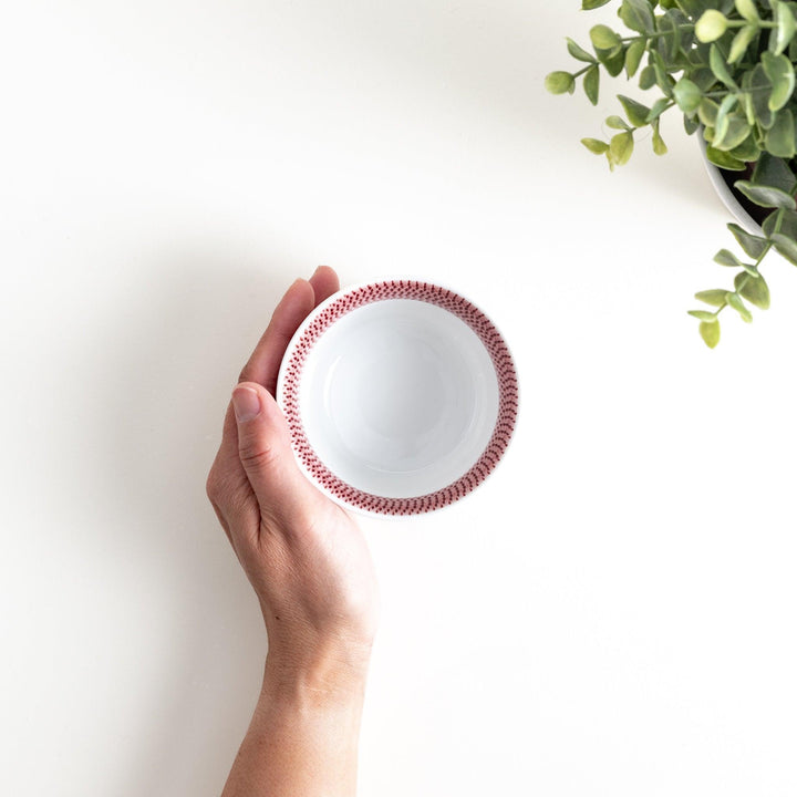 Japanese porcelain dessert bowl with delicate vertical line pattern and smooth gradient design for modern, everyday dining