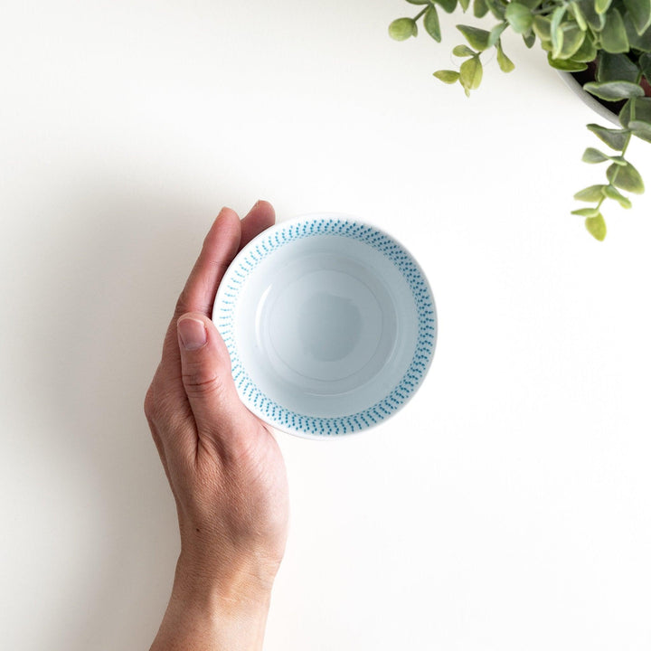 Japanese porcelain dessert bowl with delicate vertical line pattern and smooth gradient design for modern, everyday dining