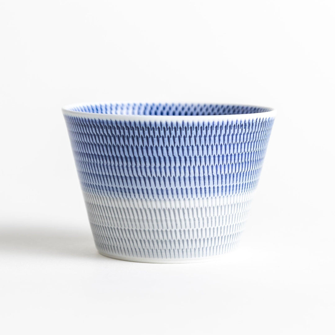 Japanese porcelain dessert bowl with delicate vertical line pattern and smooth gradient design for modern, everyday dining