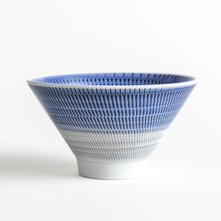 Colorful rice bowls with a gradient texture in various shades including green, blue, red, and brown.