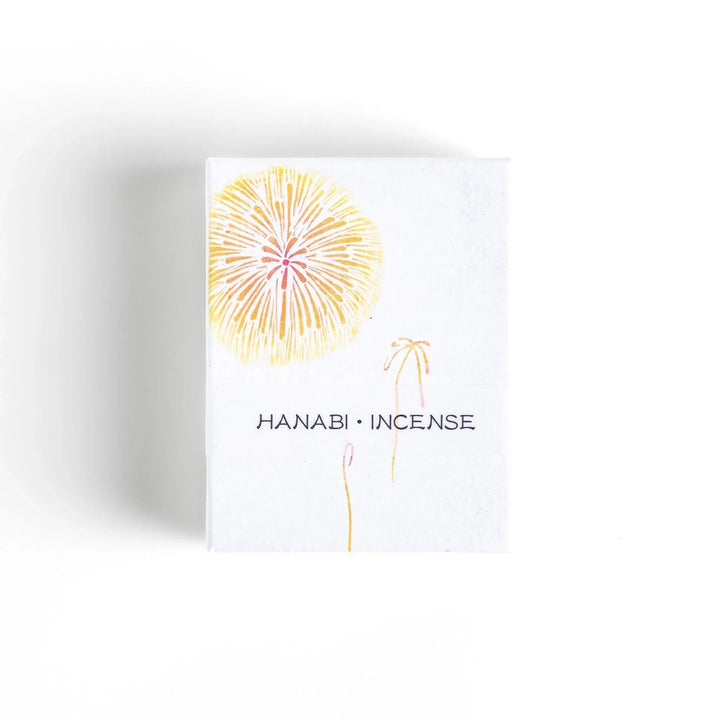 Golden incense sticks in fireworks motif box offering a bright uplifting fragrance for festive occasions.