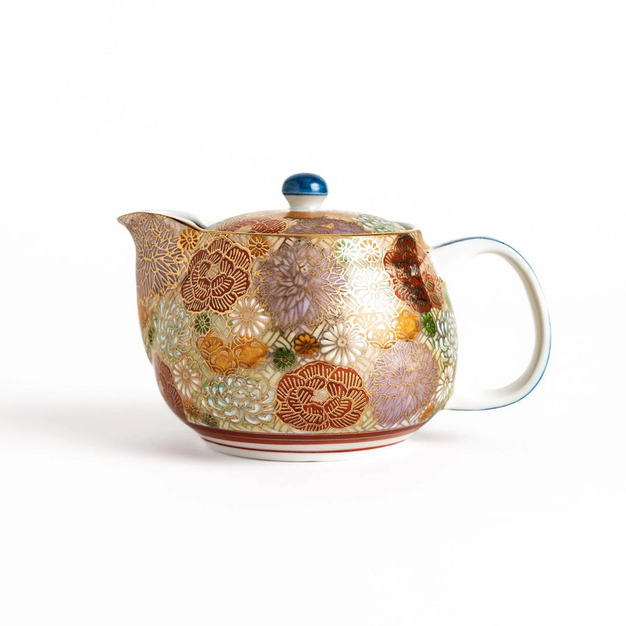 Ceramic teapot with floral pattern in gold and pastels classic design ideal for brewing Japanese tea.
